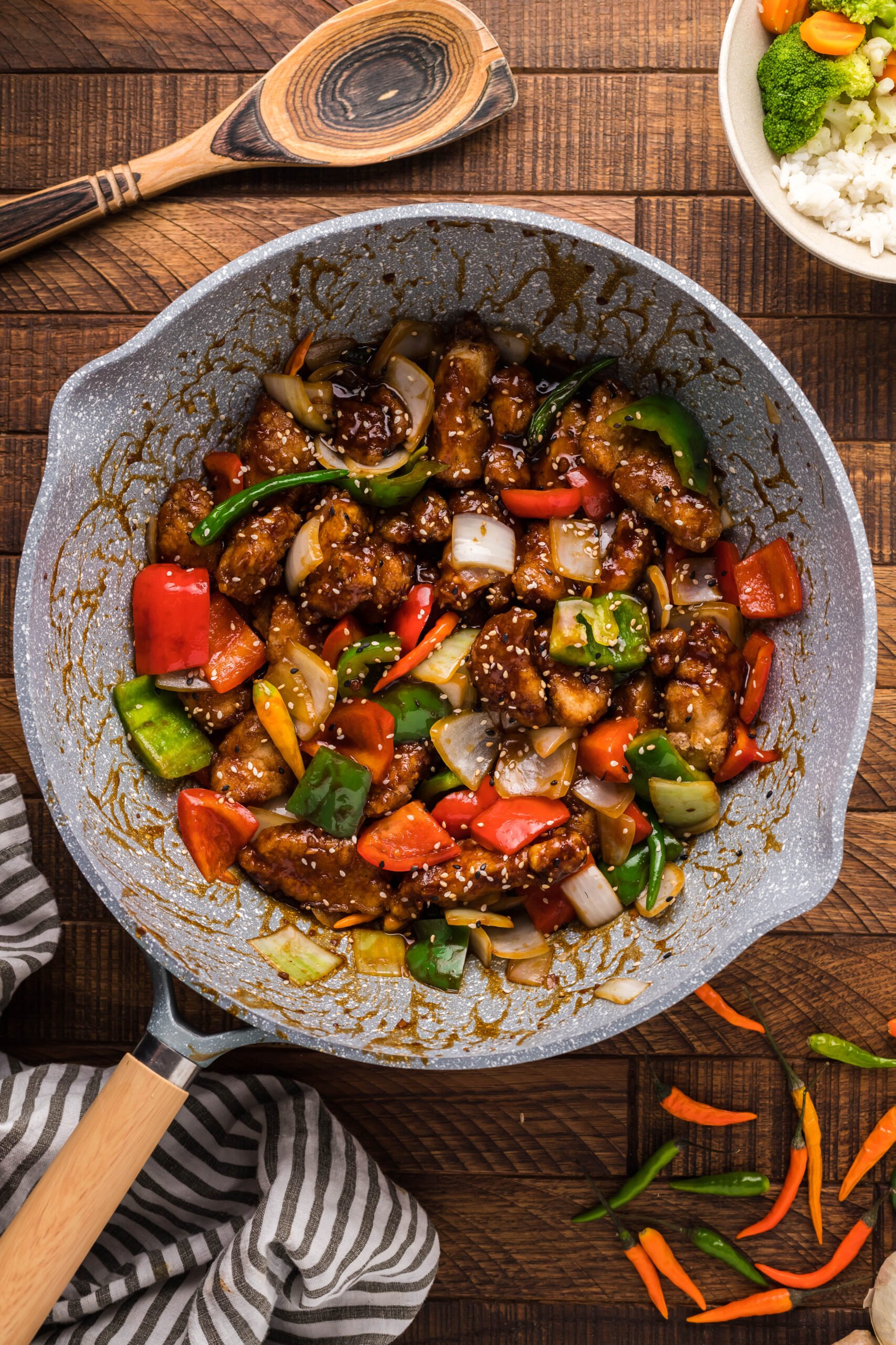overhead shot of the General Tso Chicken in a white skillet