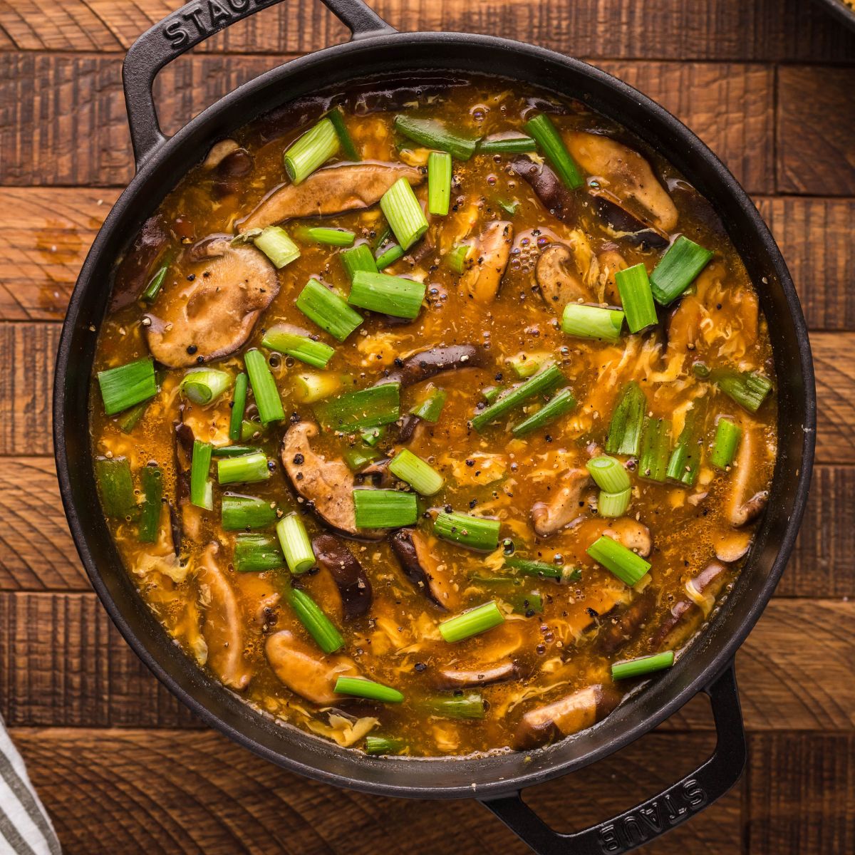 PF Changs Hot And Sour Soup in a pan on a wooden table 
