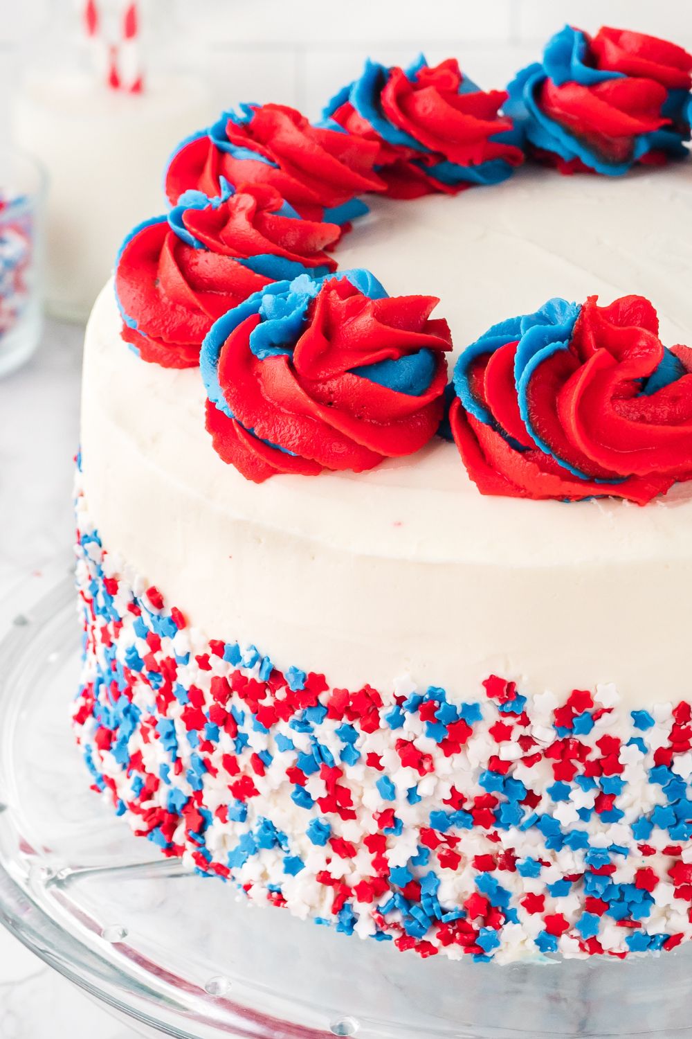 Red white and blue cake on plate on table
