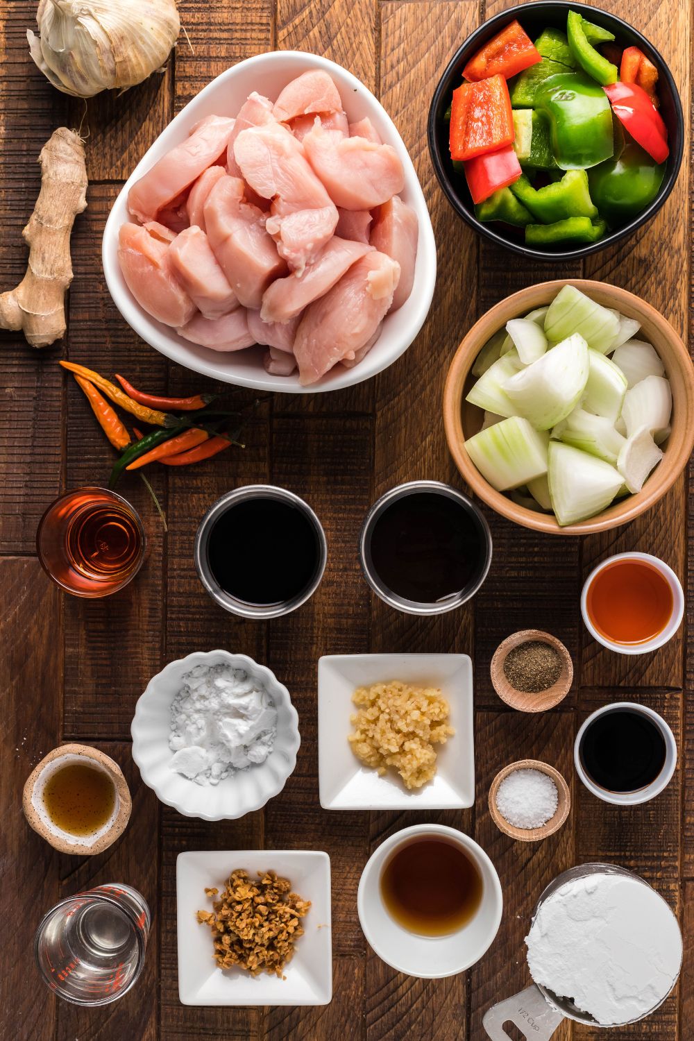 ingredients for chicken general tso all ingredients in single serve bowls on table