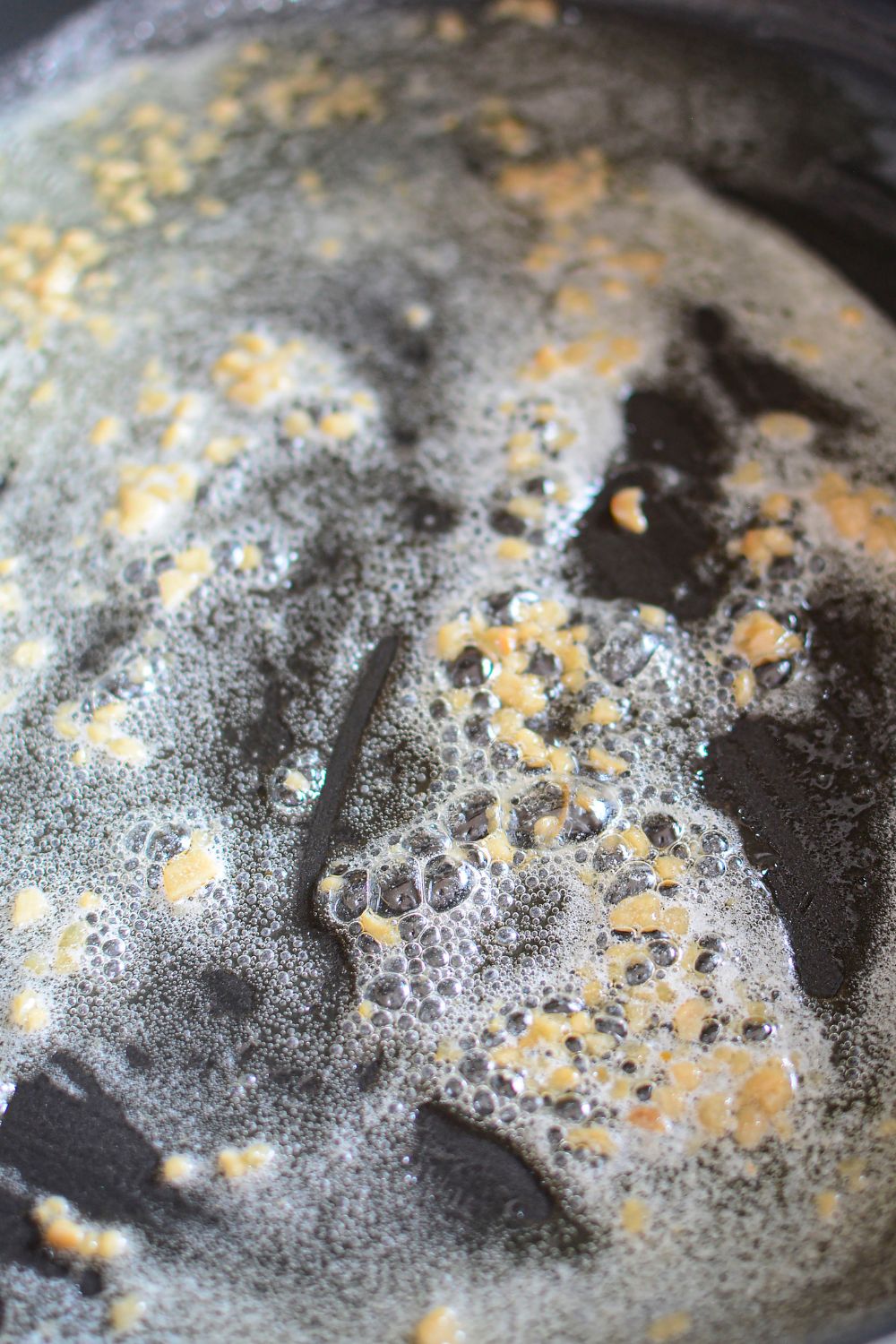 butter and garlic sauteed in skillet