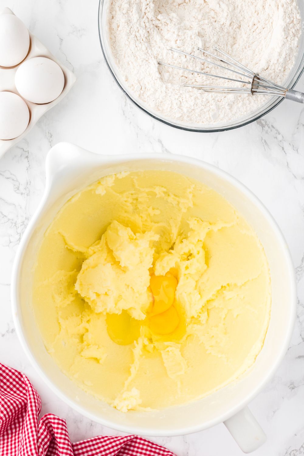 butter creamed together in bowl sitting on a table