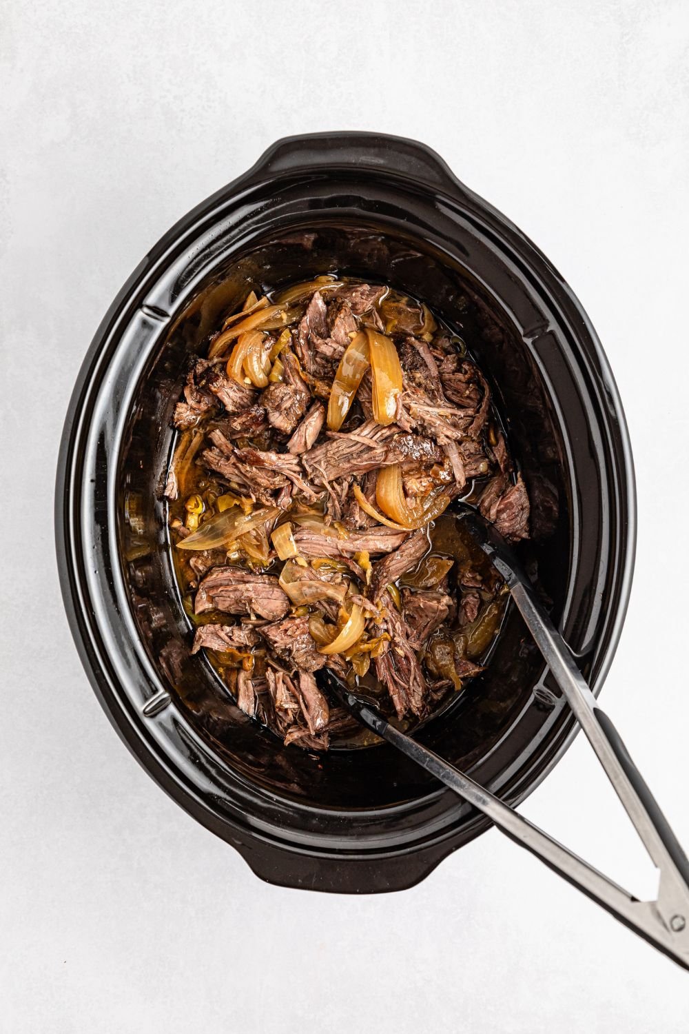 slow cooker with Mississippi Pot Roast in it 