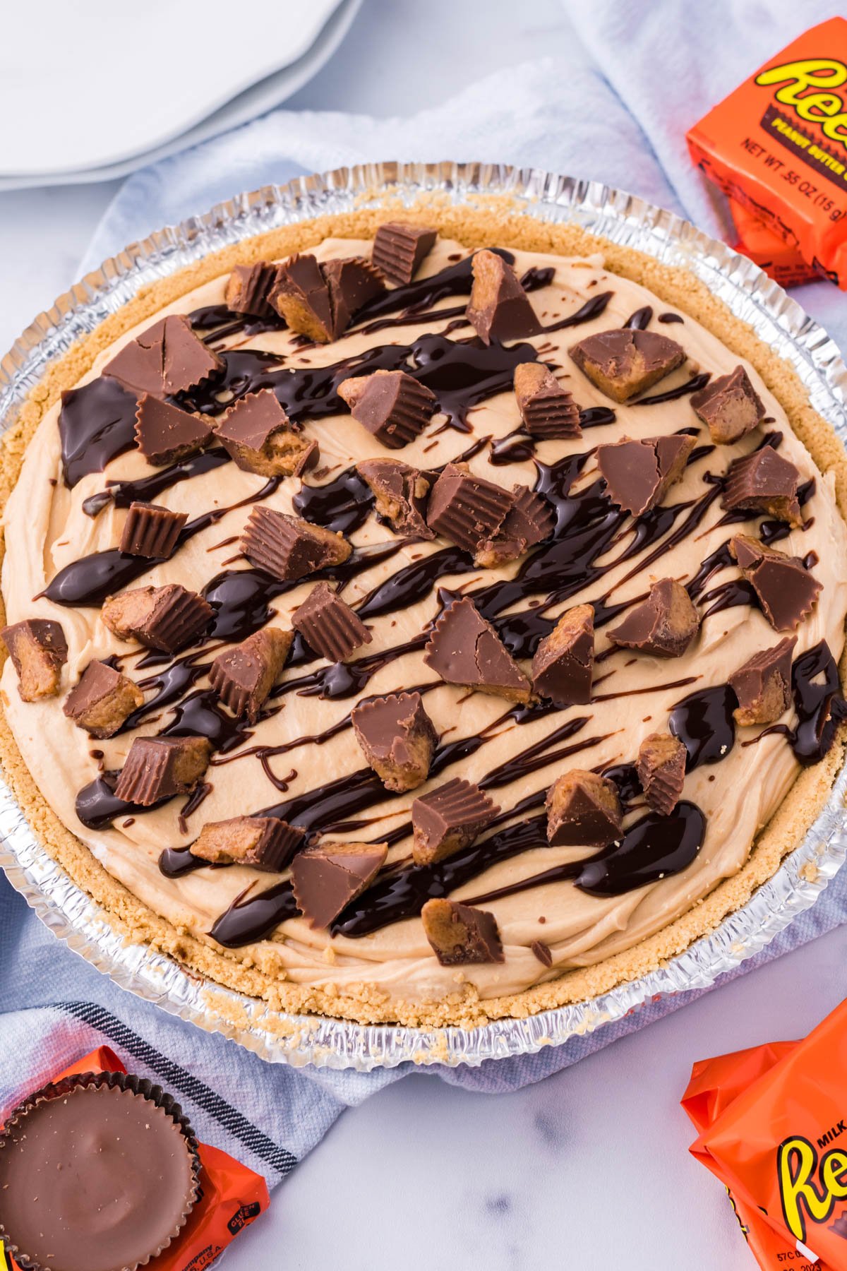 Overhead shot of the full no bake peanut butter cup pie with Reese's cup topping