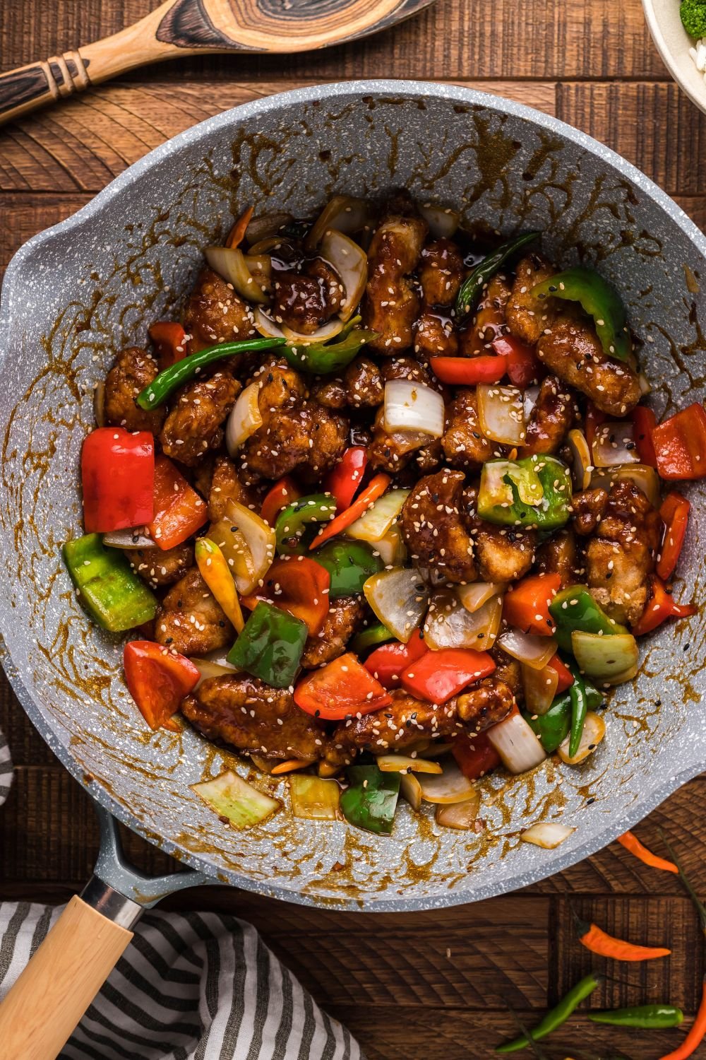 General Tso Chicken in skillet that has been tossed around to coat in sauce 