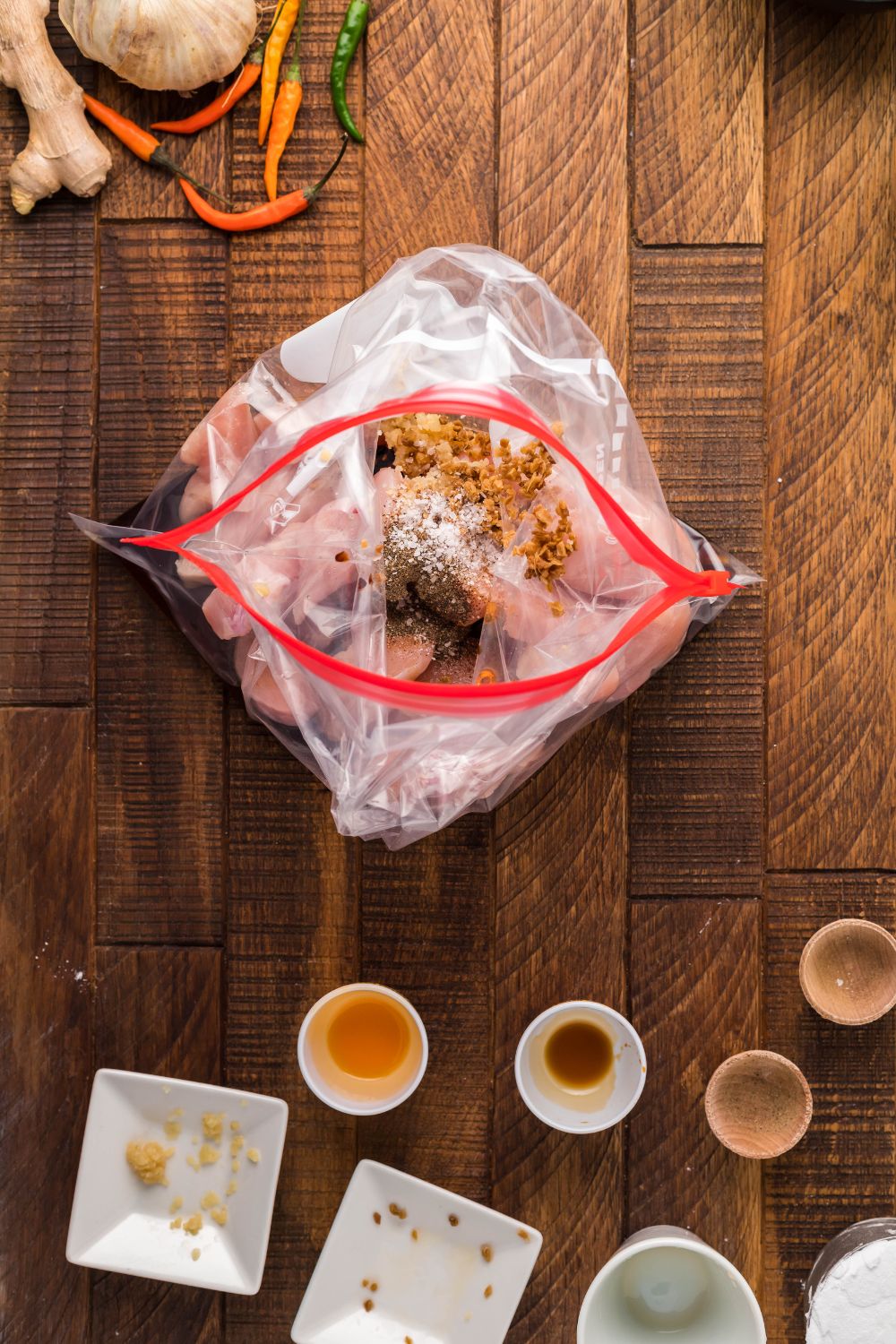cornstarch coated chicken in a Ziplock bag