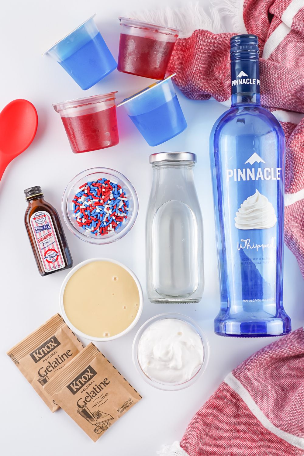 ingredients for Red White and Blue Jello Shots on table in single serve containers 