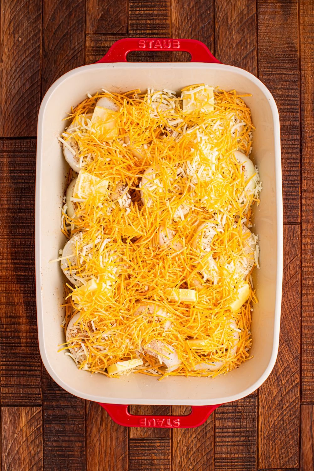 sliced onions and cheese sprinkled on top 