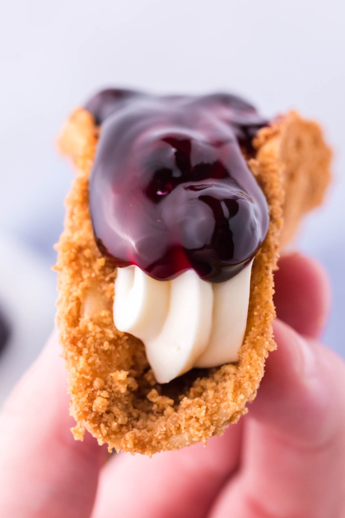 Close up of the blueberry cheesecake tacos showing all of the layers.
