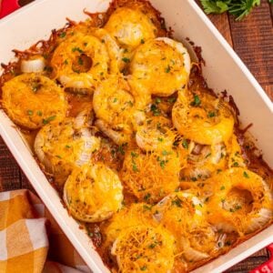 Cheesy Tennessee Onions on a casserole pan on wooden table