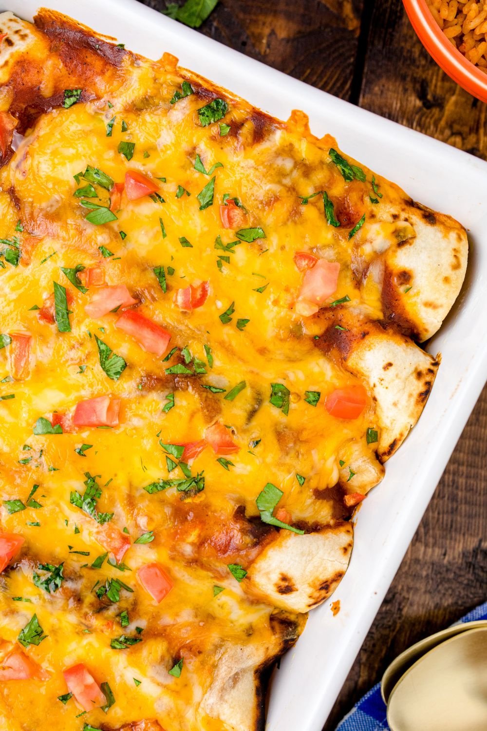 Cheesy Chicken Enchiladas in casserole pan 