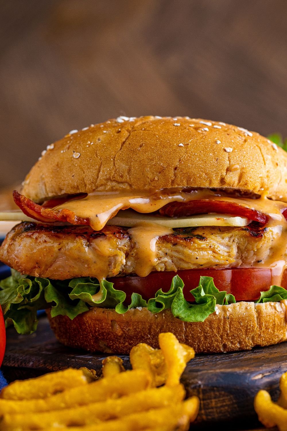 Chick Fil A Grilled Chicken Sandwich on table, with a side view of it 