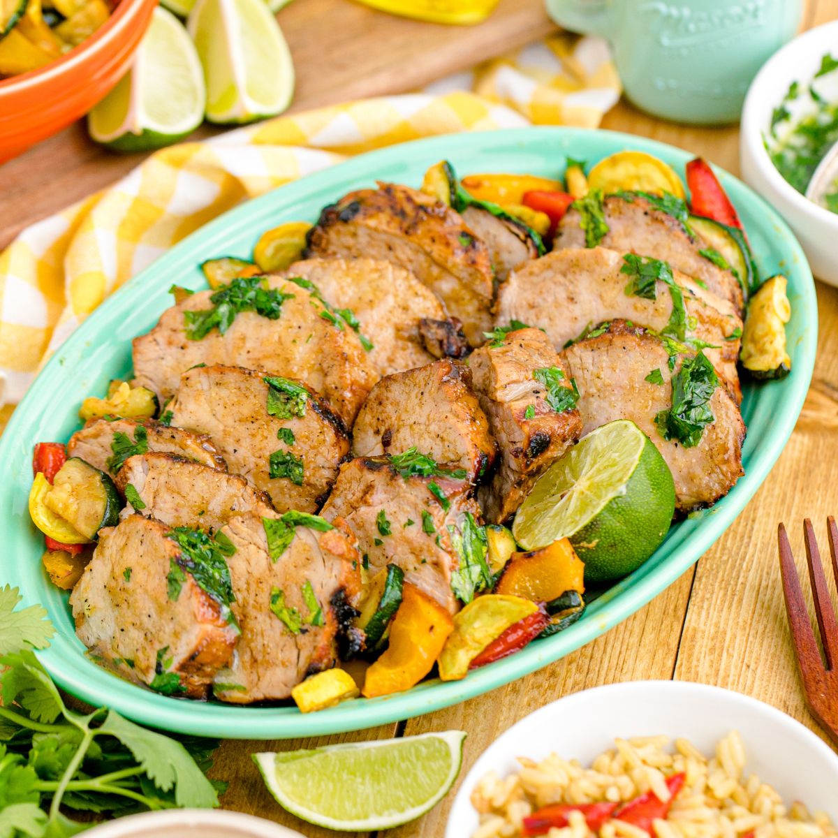 Grilled Pork Tenderloin sliced into mandolins and placed in a serving tray