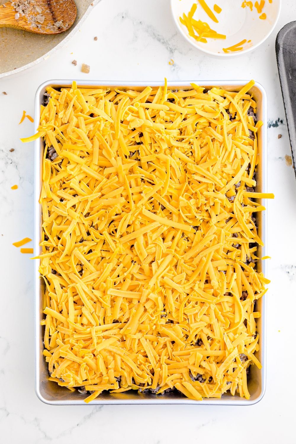 Hawaiian rolls cut in half and place in a baking dish 