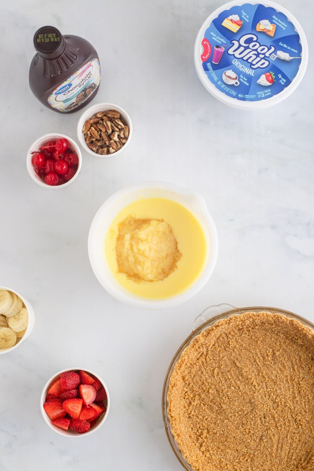 pudding in a bowl, crust to side, fruit, and more