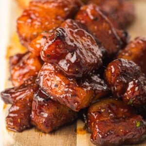 Smoked Pork Belly Burnt Ends on a cutting board