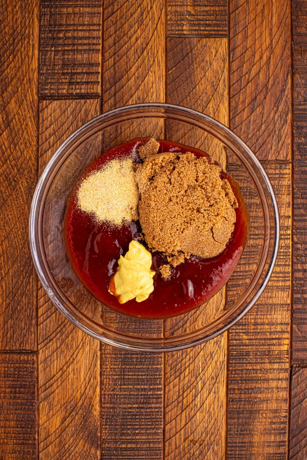 BBQ Hasselback Smoked Sausages sauce in a bowl 