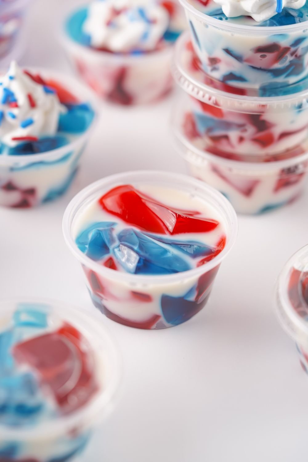 close up of Red White and Blue Jello Shots in container 