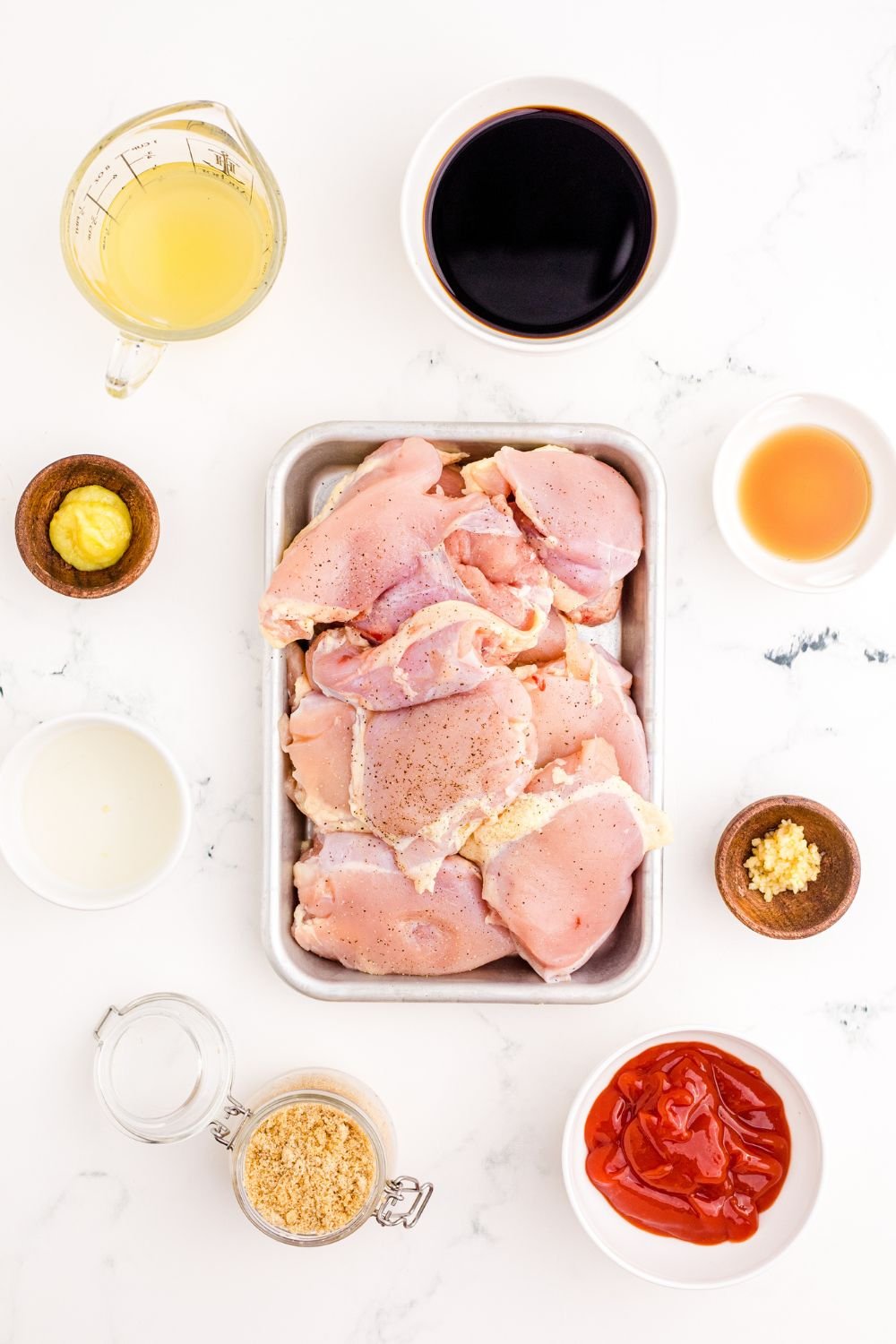 ingredients for Huli Huli Chicken on table in single serve containers 