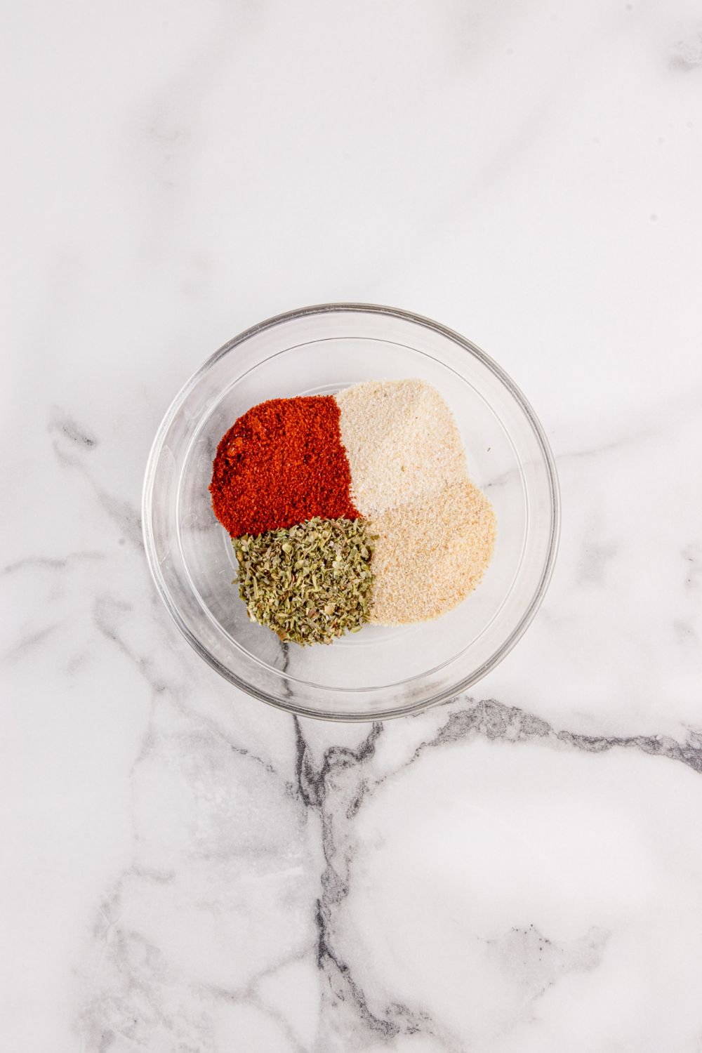 spices in a glass bowl on table 