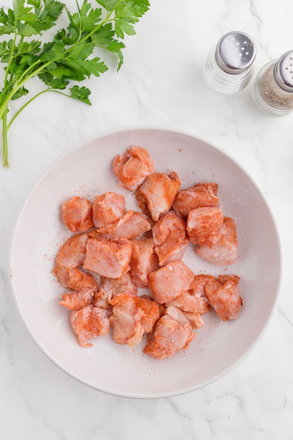 diced chicken in skillet 