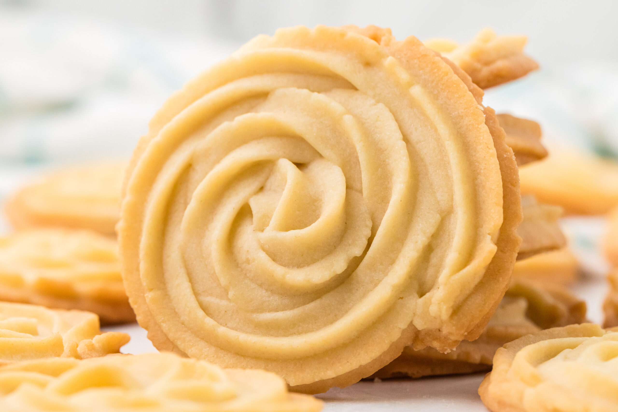 super up close photo of 3 Ingredient Butter Cookies on a white marble table 