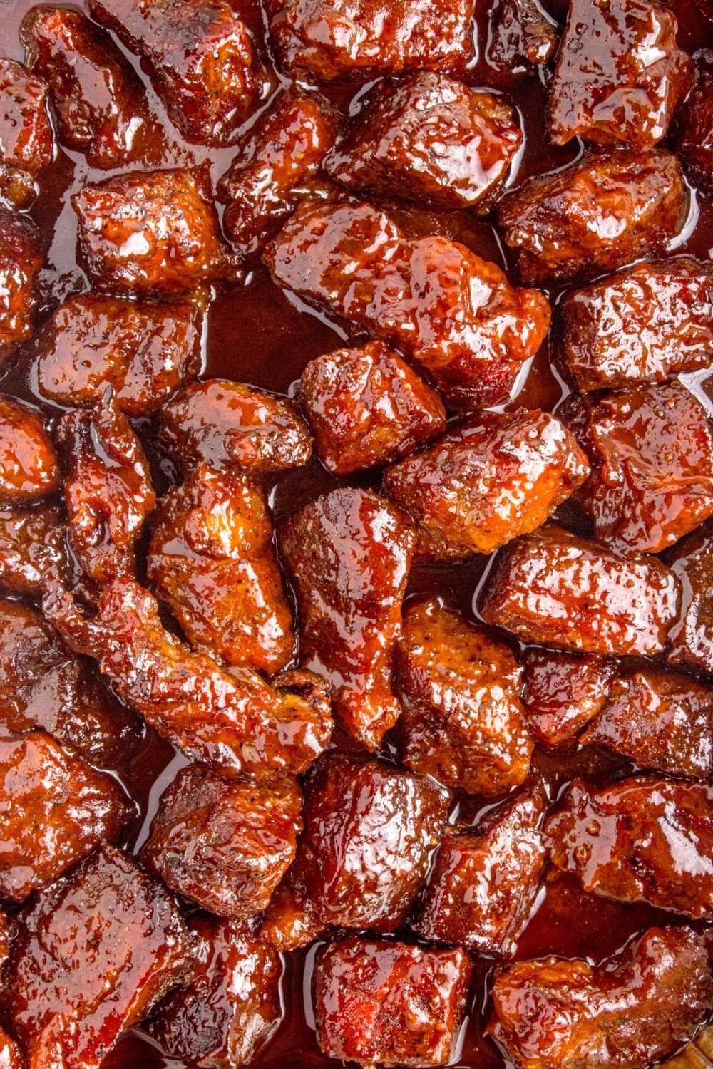 overhead look of Chuck Roast Burnt Ends in a pan on table 