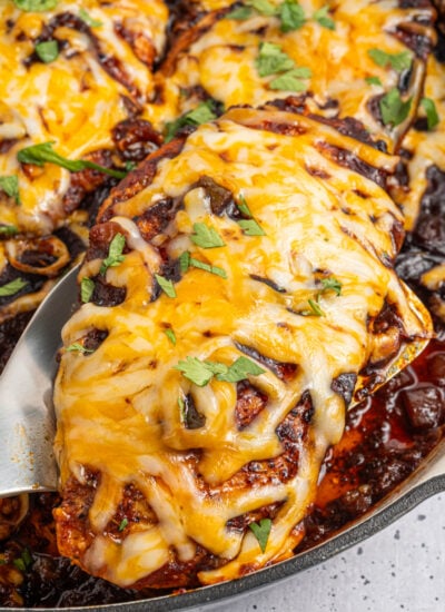 Cheesy Salsa Chicken in a white skillet