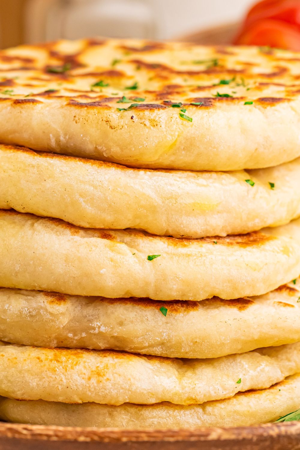 close up of a stack of 3 Ingredient Flatbread to show how thick and fluffy they are 