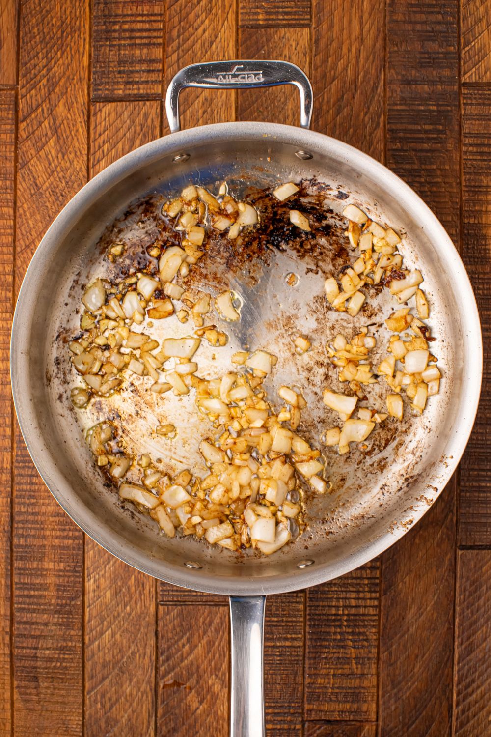 sauted onions in a skillet on the table 
