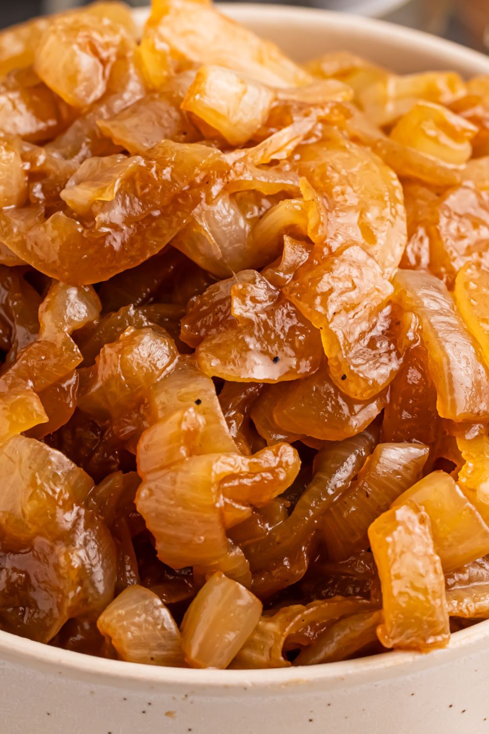CrockPot Caramelized Onions in a bowl on table 