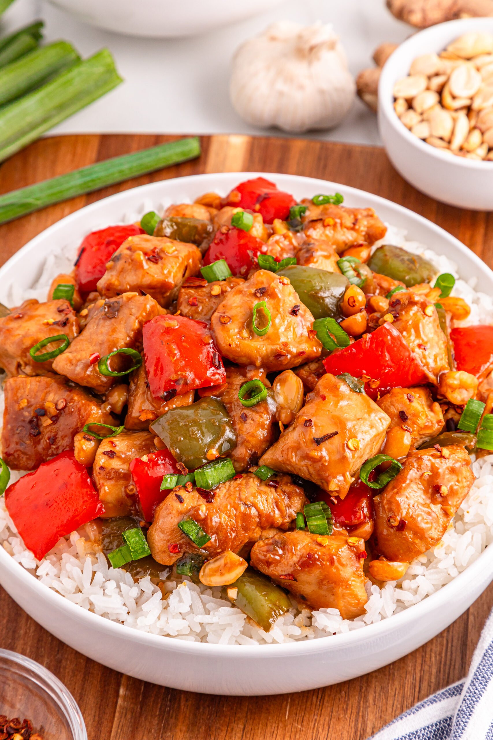 Better Than Takeout Kung Pao Chicken in a large white bowl 