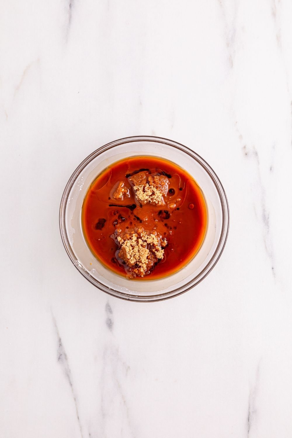 sauce for Better Than Takeout Kung Pao Chicken in a small glass bowl 