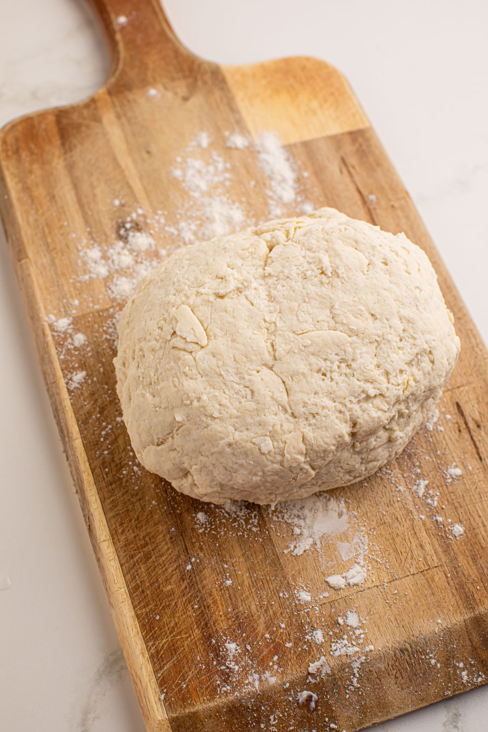 3 Ingredient Flatbread dough on a cutting board