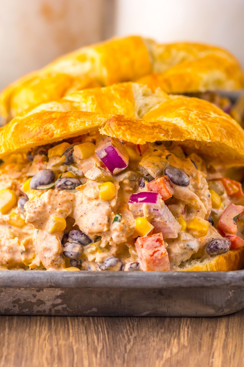close up Creamy Taco Chicken Salad sandwiches on table  