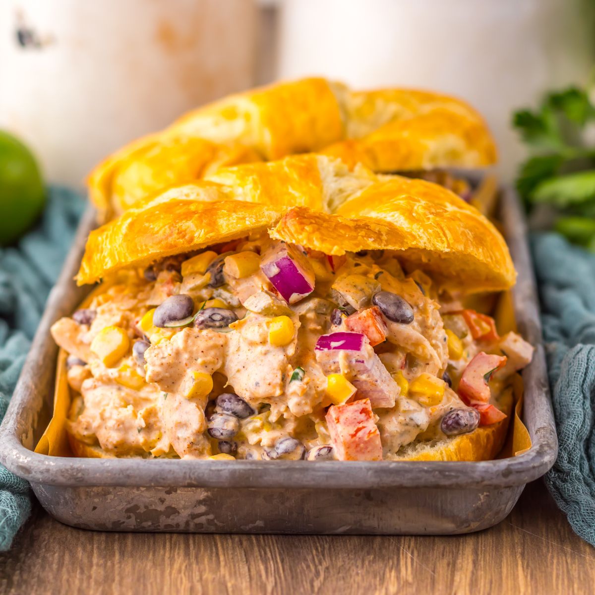 Creamy Taco Chicken Salad on a plate in croissants