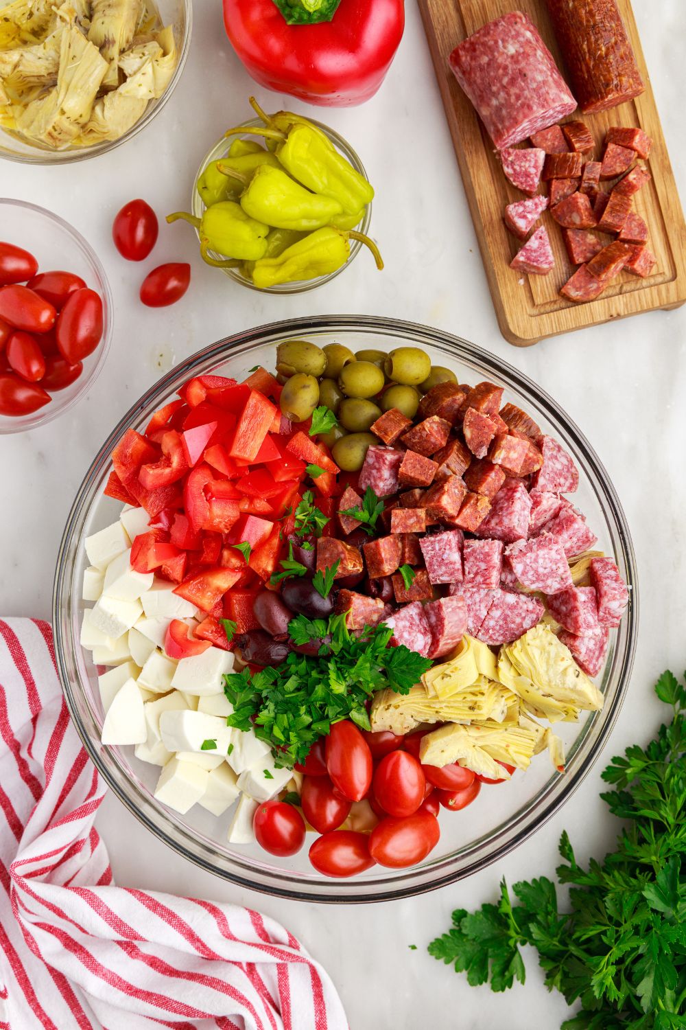 Antipasto Tortellini Pasta Salad all piled into a glass bowl 