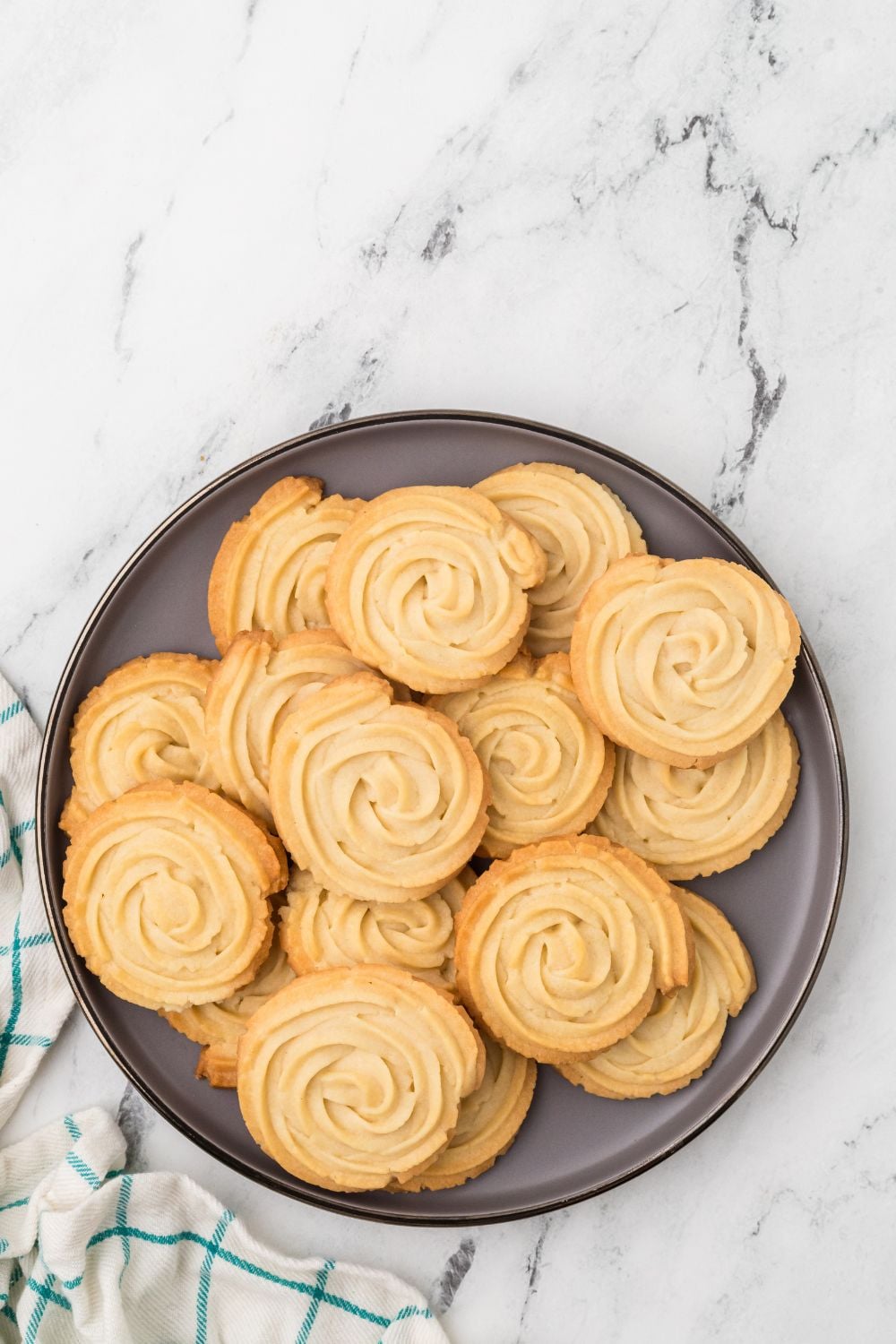 Butter Cookies on a plate sitting on table 