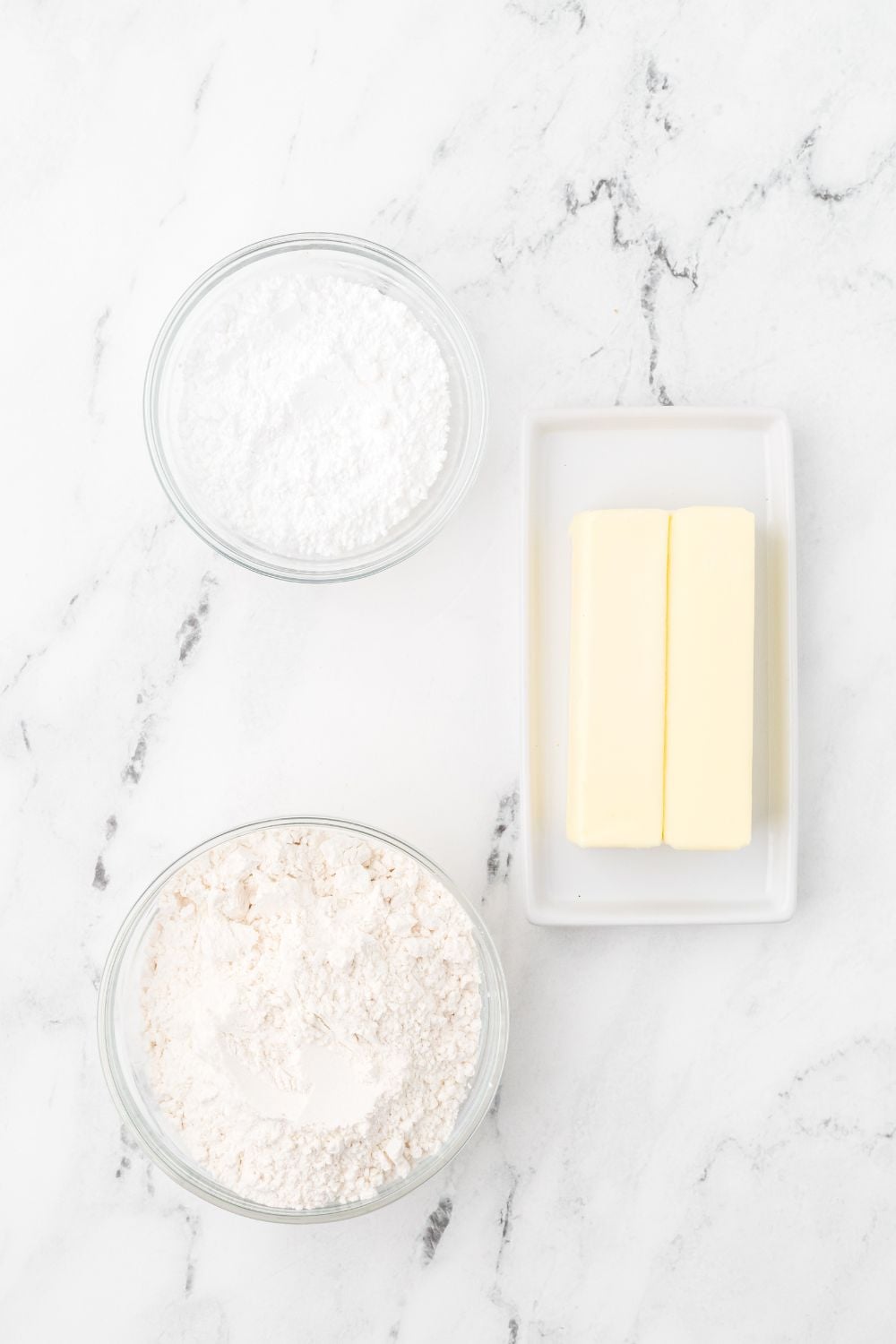 ingredients for Butter Cookies on table in single serve bowls 