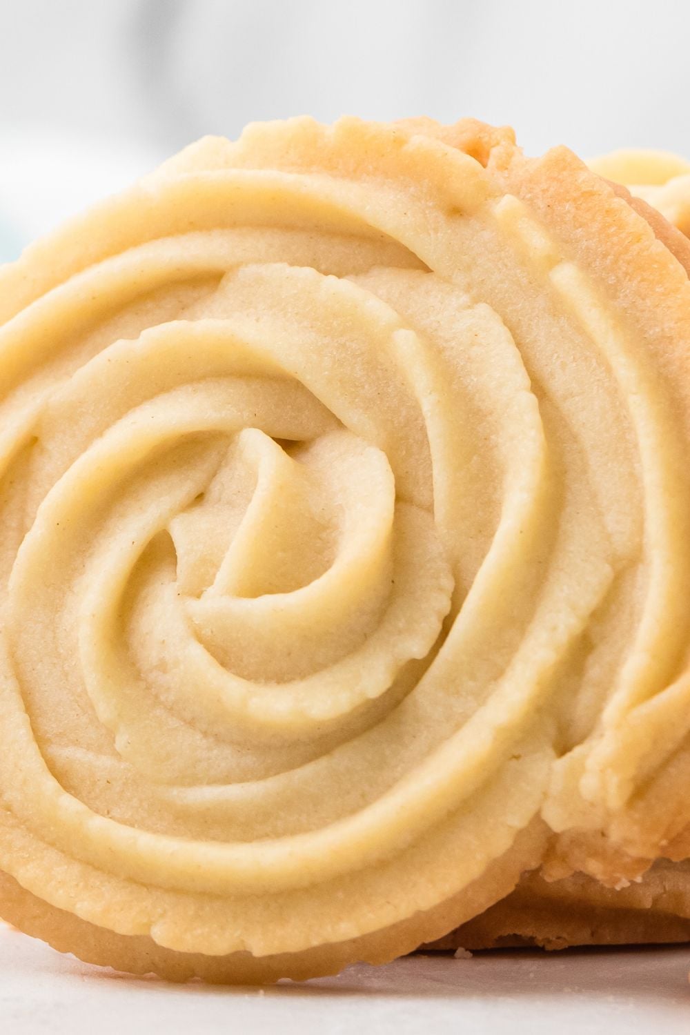 Butter Cookies on side sitting on table to see the swirls 