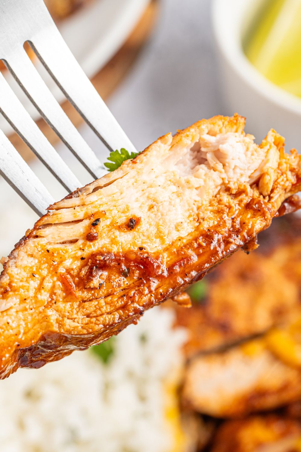 fork with a piece of Cheesy Salsa Chicken