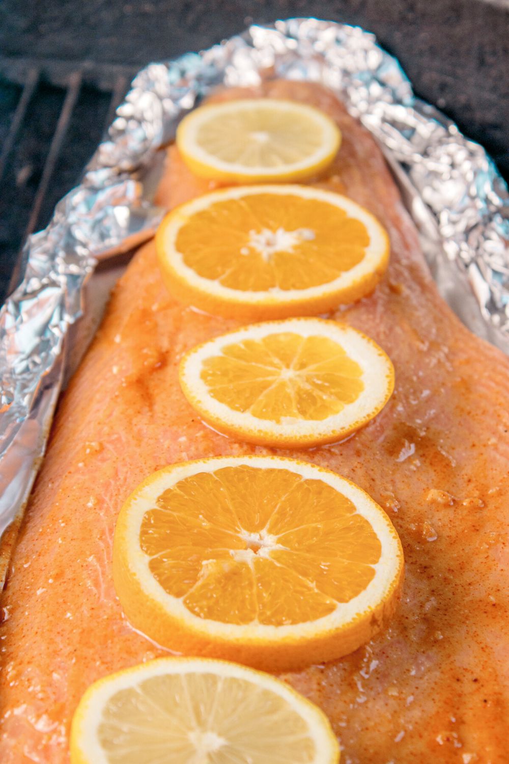 close up of Grilled Honey Mustard Salmon in Foil on the grill 