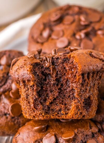 Costco Double Chocolate Muffins on plate with a bite taken out of one of the muffins