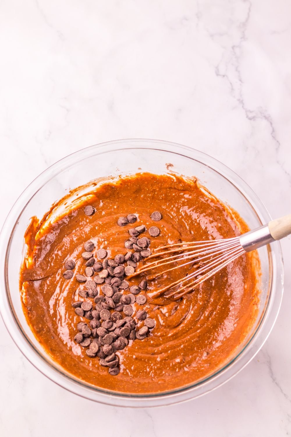 Costco Double Chocolate Muffin batter in a glass bowl on table