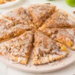 close up view of Easy Apple Pie Pizza cut and placed in a circle and on table