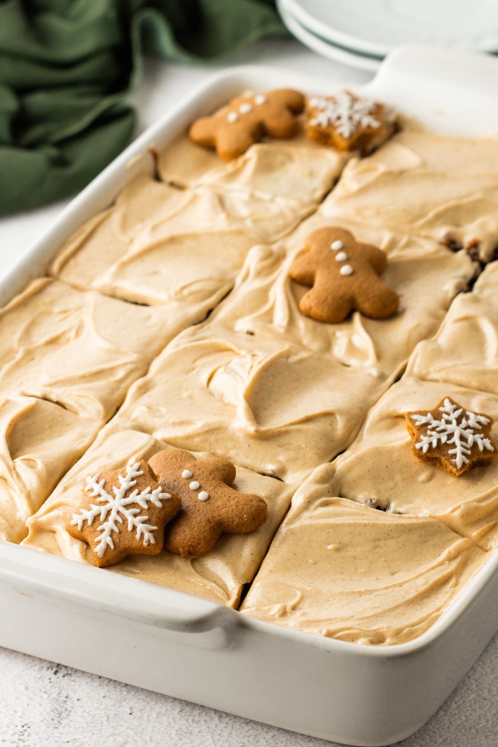 Gingerbread Cake with Cream Cheese Frosting in pan cut into squares 