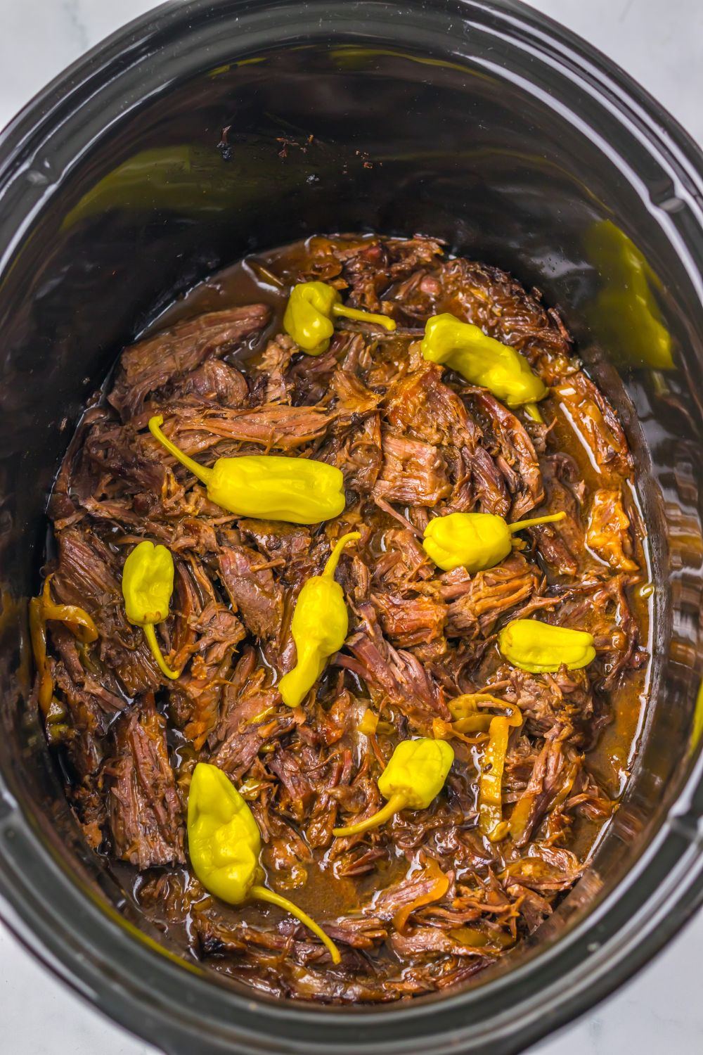 overhead look of Slow Cooker Mississippi Pot Roast in the pan 