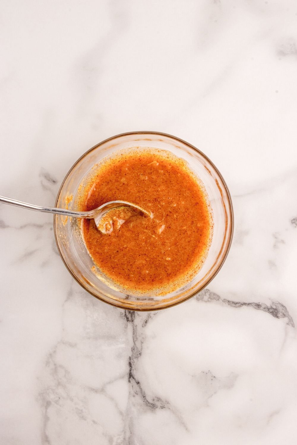 sauce for making Grilled Honey Mustard Salmon  in a glass bowl 