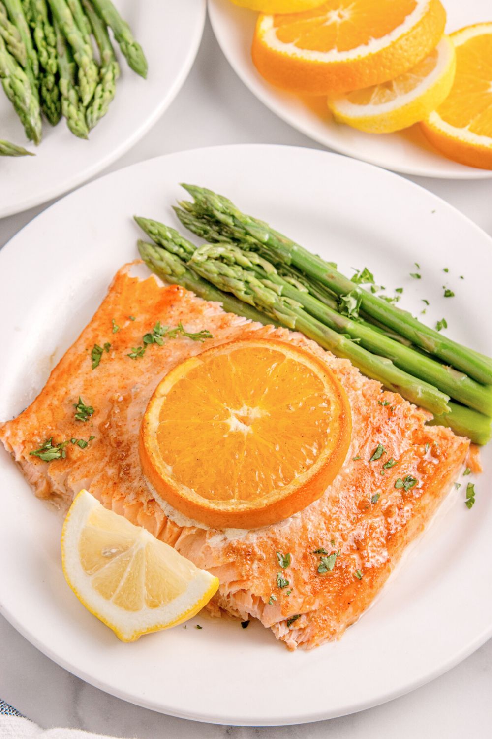 Grilled Honey Mustard Salmon on plate with asparagus 