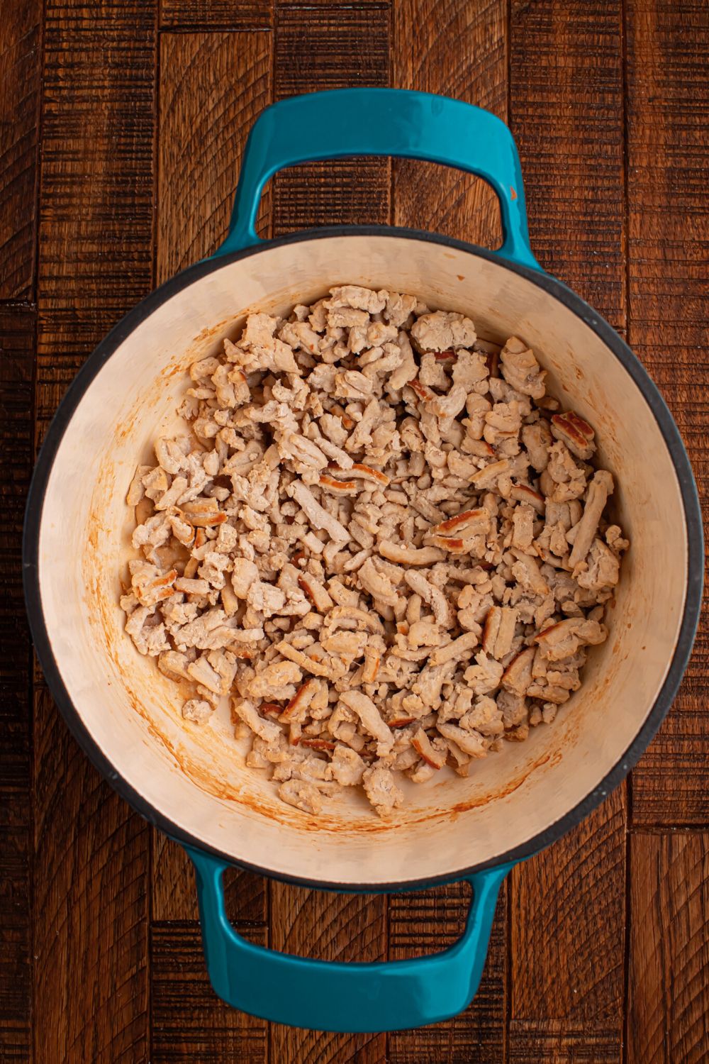 ground chicken in a pot sitting on table